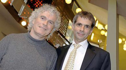 Die Neuerer: Chefdirigent Simon Rattle und Philharmoniker-Intendant Martin Hoffmann.