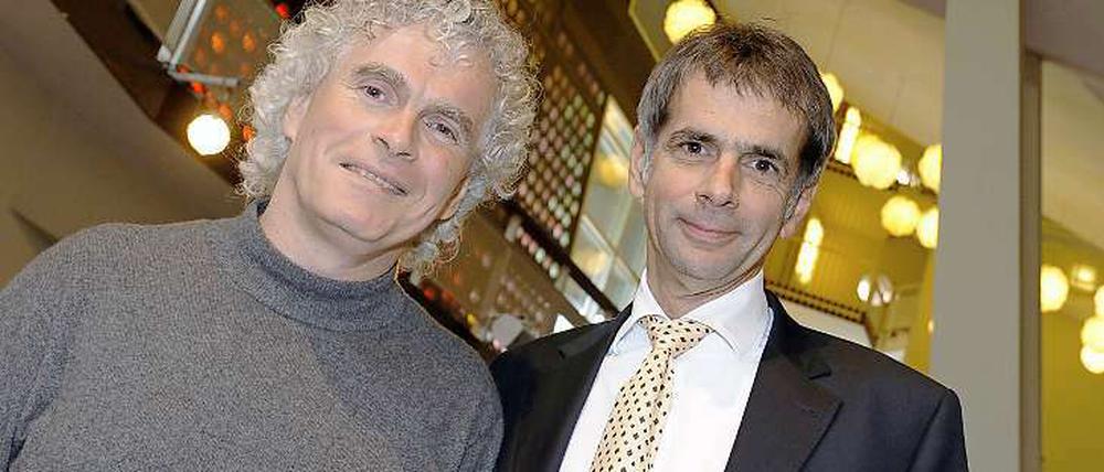 Die Neuerer: Chefdirigent Simon Rattle und Philharmoniker-Intendant Martin Hoffmann.