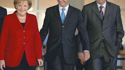 Jeder will der lachende Dritte sein: Angela Merkel, Guido Westerwelle und Horst Seehofer.