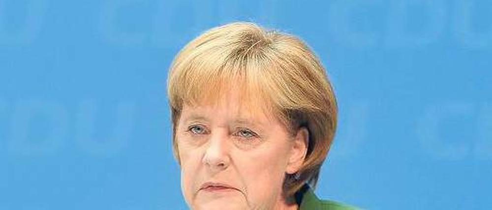 Erklärungsbedarf. Merkel stellte die CDU- Basis aber nicht ganz zufrieden. Foto: ddp