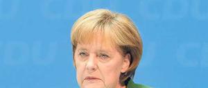 Erklärungsbedarf. Merkel stellte die CDU- Basis aber nicht ganz zufrieden. Foto: ddp