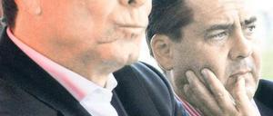 So sehen keine Freunde aus: Die Parteichefs Sigmar Gabriel (im Hintergrund) und Klaus Ernst beharken sich derzeit gegenseitig.