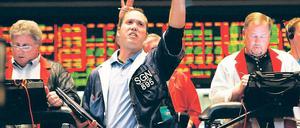 Nachschlag, bitte! Händler an der Börse in Chicago können dank der schwankenden Preise viel Geld verdienen. Foto: dpa