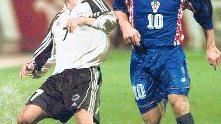 Dariusz Wosz spielte erst für die DDR, dann im gesamtdeutschen Dress.