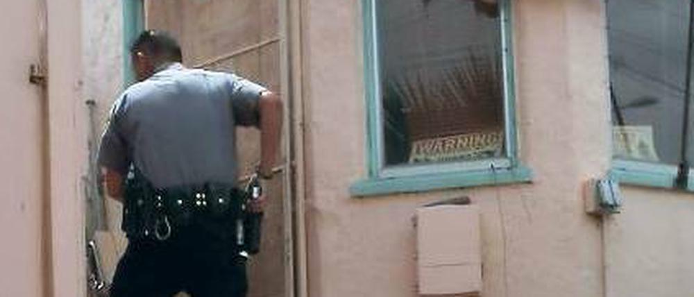 Bewaffnetes Räumkommando. Drei Millionen Häuser wurden seit 2007 in den USA zwangsgeräumt.