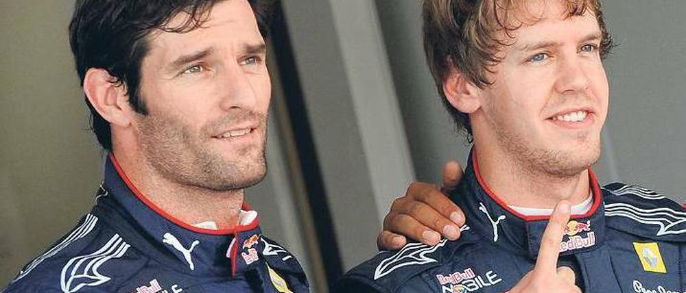 Der Konkurrent von nebenan. Webber (links) und Vettel müssen sich nicht gegenseitig vorlassen. Foto: dpa