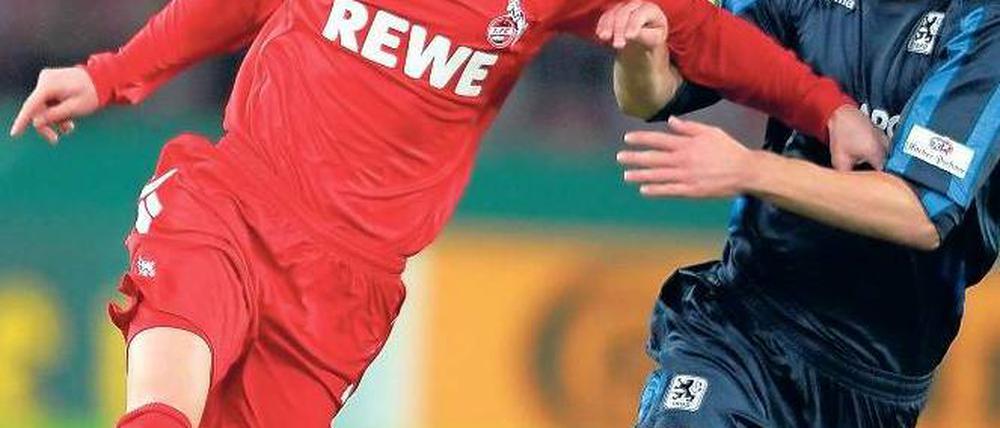 Sieger im Armdrücken. Der Kölner Novakovic ist dem Münchner Bülow voraus. Foto: dpa