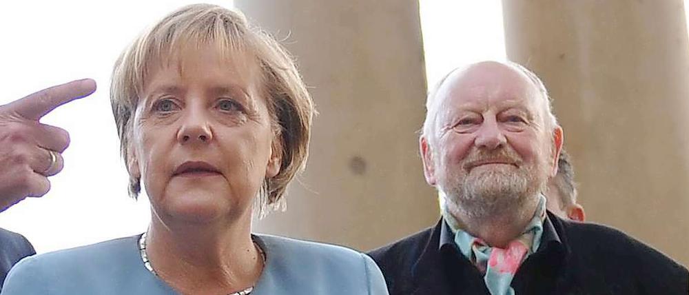 Angela Merkel mit dem dänischen Mohammed-Karikaturisten Kurt Westergaard.