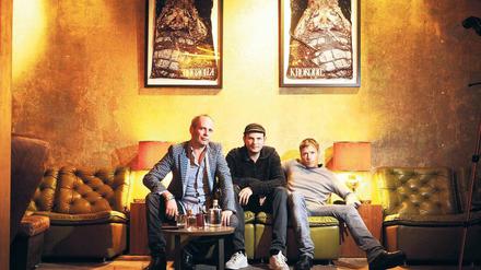 Mit Konzept. Fotograf Sascha Kramer, Clubgröße Cookie und Marcus Trojan vom Weekend haben die Bar in der Torstraße gemeinsam eröffnet (von links).