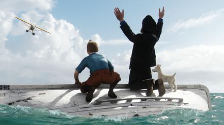 Dreidimensional: Tim (gespielt von Jamie Bell), Kapitän Haddock (Andy Serkis), und Struppi, die auf Rettung aus der Luft warten.