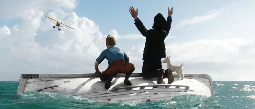 Dreidimensional: Tim (gespielt von Jamie Bell), Kapitän Haddock (Andy Serkis), und Struppi, die auf Rettung aus der Luft warten.