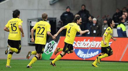 Nicht zu halten: Torschütze Kagawa (r.) und seine Kollegen laufen der Konkurrenz in der Bundesliga weiter davon.