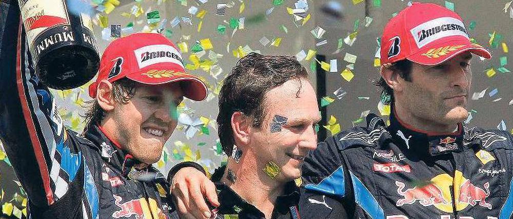 Zwei ist einer zu viel. Vettel und Webber mit Teamchef Horner (Mitte).