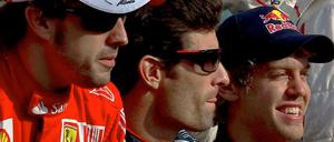Fernando Alonso (links) hatte vor dem Rennen die besten Chancen auf den Titel, Mark Webber (Mitte) lag dahinter vor dem Deutschen Sebastian Vettel. Der galt eigentlich nur als Außenseiter.