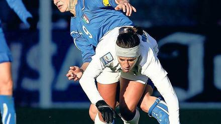 In die Endrunde gestolpert. Die Frauen der USA (vorne mit Carli Loyd) qualifizierten sich als letztes Team für die WM.Foto: AFP