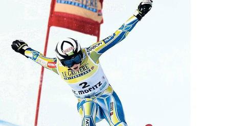 Brot und Spiele. Die Slowenin Marusa Ferk stürzte gestern beim Super-G in St. Moritz. Nach weiteren Stürzen wurde das Rennen wegen zu starken Windes abgebrochen. Foto: AFP