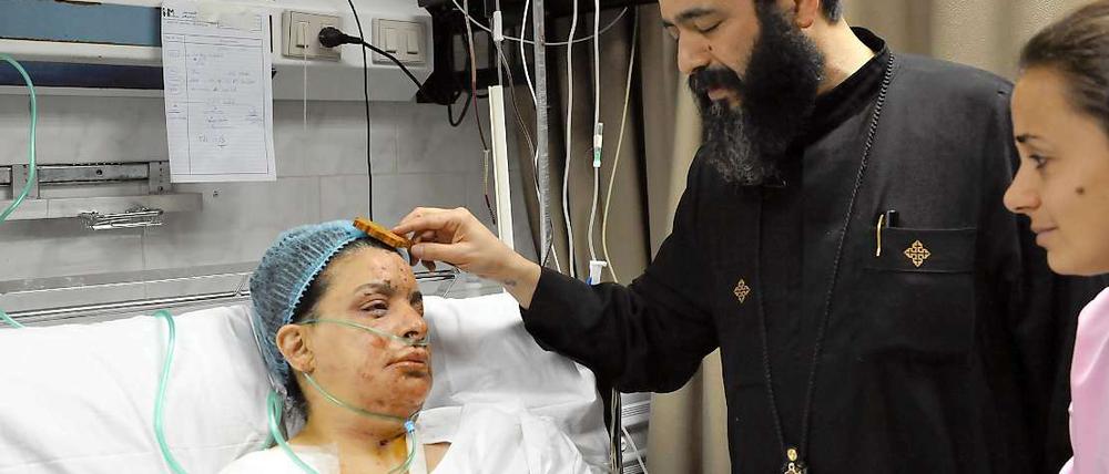 Die schwer verletzte Eman Ibrahim auf der Intensivstation des koptischen Sankt Markus Hospitals.