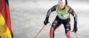 Spaß am Sport. Andrea Henkel denkt auch mit 33 Jahren nicht daran, ihre Karriere zu beenden. Im deutschen Team ist sie eine wichtige Stütze. 