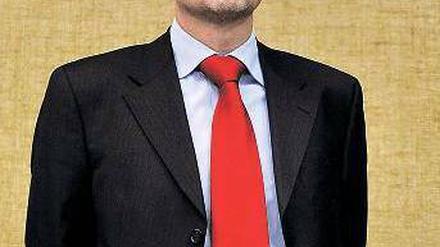 Gespannt. Thomas Ganswindt weicht den Kameras am ersten Prozesstag nicht aus. Zur Sache aber schweigt er. Am kommenden Dienstag geht es weiter. Foto: dapd