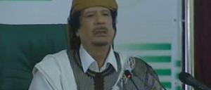 Muammar al Gaddafi.