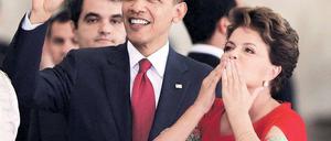 Erste Station. US-Präsident Obama wurde am Samstag zum Auftakt seines Besuches in Brasilien von seiner Amtskollegin Rousseff mit militärischen Ehren empfangen. Foto: Reuters