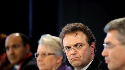 Innenminister Friedrich verärgert mit seinem Fokus auf die Sicherheit die Teilnehmer der Islamkonferenz.