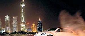 Welttournee an einem Tag. In Schanghai begann am Montag die Premierenshow für den neuen VW Beetle – es folgten am Abend Berlin und New York. 