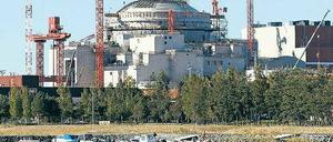 Atomkraftwerk mit Meerblick. Auf der Halbinsel Olkiluoto an der finnischen Westküste entsteht einer der modernsten Reaktoren der Welt. Foto: Bob Strong/Reuters