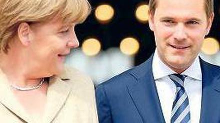 Die Chefin und ihr neuer Minister. Angela Merkel und Daniel Bahr. Foto: dapd