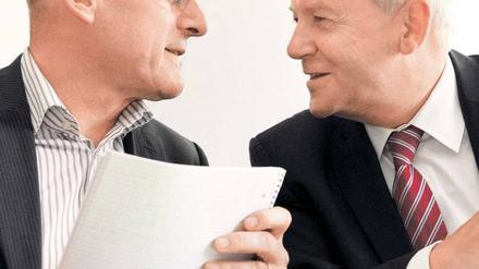 Im Streit vereint: Minister Hermann (Grüne) und Bahn-Chef Grube.