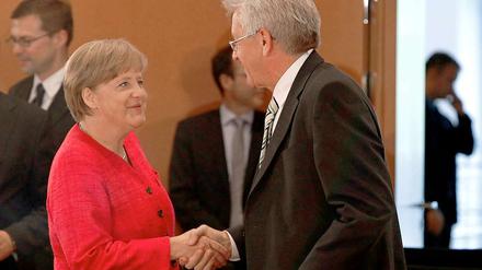 Auge in Auge mit Kanzlerin Merkel: Baden-Württembergs Regierungschef Kretschmann.
