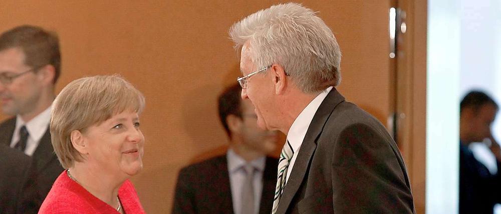 Auge in Auge mit Kanzlerin Merkel: Baden-Württembergs Regierungschef Kretschmann.