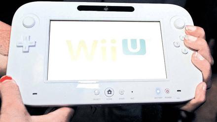 Mit dem großen Display sieht der Controller der „Wii U“ wie ein Tablet-PC aus. Mit der neuen Konsole kann mit und ohne Fernseher gespielt werden. Foto: AFP