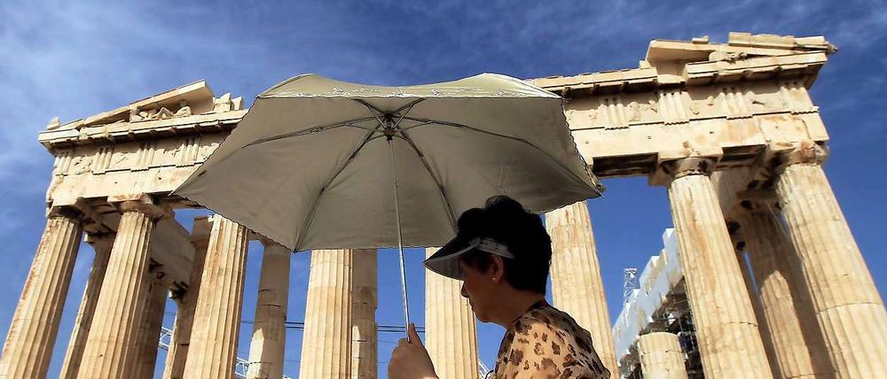 Der Staatsbankrott sei abgewendet, berichteten die EU-Diplomaten nach der Telefonkonferenz, in der eine Hilfszahlung in Höhe von zwölf Milliarden Euro bewilligt wurde.