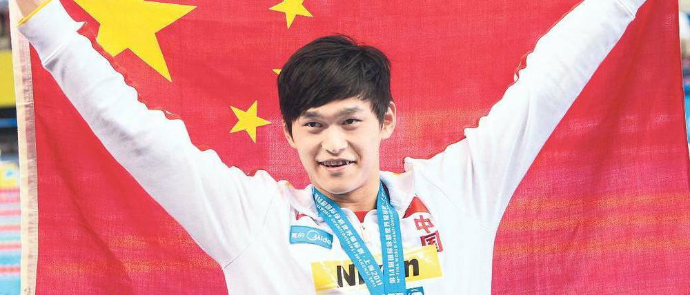 Rot im Rücken. Sun Yang trainiert unter chinesischer Flagge in Australien. Foto: dpa
