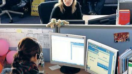 Verkabelt. Telefonjobs werden in Berlin immer zahlreicher.