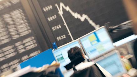 Nervöser Handel. Nach einem Einbruch um mehr als sieben Prozent rettete sich der Dax am Dienstag zeitweise ins Plus.