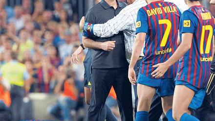 Warten auf das große Spektakel. Hitzige Szenen wie hier beim Supercup zwischen Barcelona und Real Madrid wird es in Spanien so schnell nicht mehr geben. Die Spieler streiken. Foto: dpa
