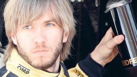 Umsteigen! Nick Heidfeld wird die Formel 1 wohl verlassen und vermutlich künftig in der DTM für BMW fahren. Foto: dapd