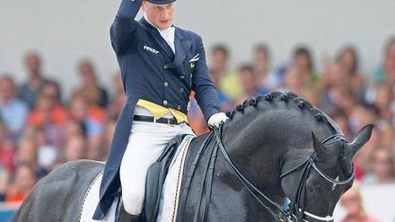 Zum Köpfe senken. Die Leistung von Matthias Rath und Totilas bei der EM reichte nur für Platz fünf. Foto: dpa