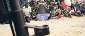 Hitze und Waffen. Dürren können schwelende Konflikte weiter anheizen. Foto: AFP