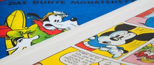 Klassiker: Das Cover des ersten Micky-Maus-Hefts und einige Szenen aus dem Inneren der Zeitschrift.