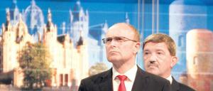 Farbenspiele im Nordosten. Erwin Sellering (SPD), Ministerpräsident von Mecklenburg-Vorpommern, und der Spitzenkandidat der CDU, Lorenz Caffier (rechts).