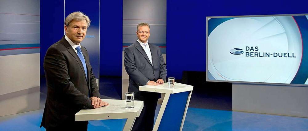 Klaus Wowereit, Frank Henkel und ein Berlin-Duell.