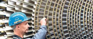 Ein großes Rad. Der deutsche Maschinenbau legt 2011 um 14 Prozent zu. Foto: dpa