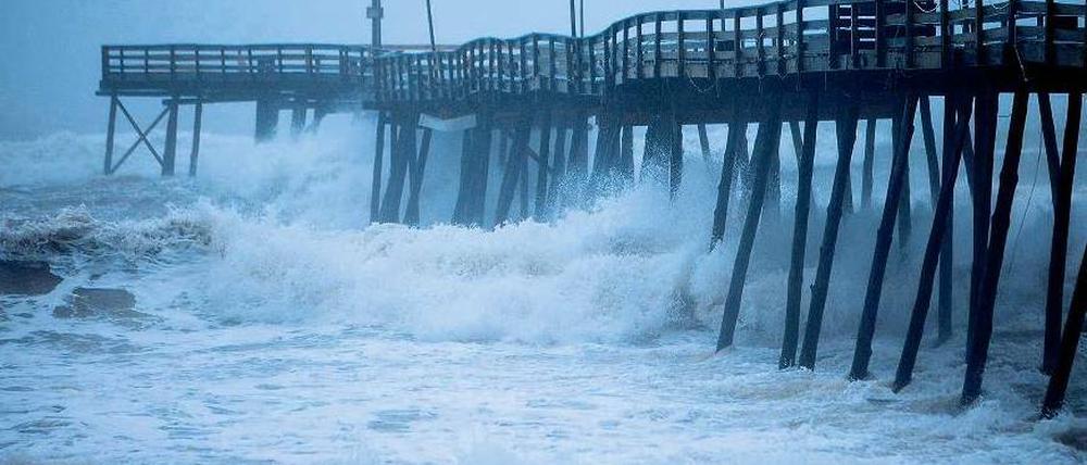 Weltuntergang. Die Zahl der Naturkatastrophen – im Bild „Irene“ in North Carolina – nimmt zu. Im ersten Halbjahr mussten die Versicherer 63 Milliarden US-Dollar zahlen.