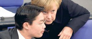 Darf man Hellas jetzt schon verloren geben? Kanzlerin Angela Merkel und Wirtschaftsminister Philipp Rösler haben Timing-Probleme.