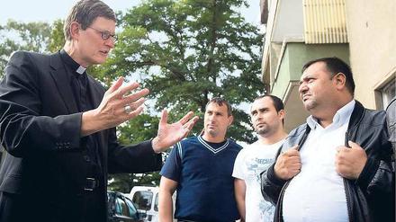 Mit den Händen der Kirche. Am Mittwoch besuchte Erzbischof Rainer Maria Woelki das Quartier.