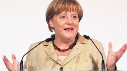 In einen Wettbewerb um Schnelligkeit sollten die Zeitungsverleger im Internet-Zeitalter nicht eintreten, sagte Kanzlerin Angela Merkel am Montag beim BDZV-Kongress. Foto: dpa