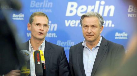 Bürgermeister Klaus Wowereit (r.) und SPD-Landeschef Michael Müller sind bereit für eine Koalition mit den Grünen.
